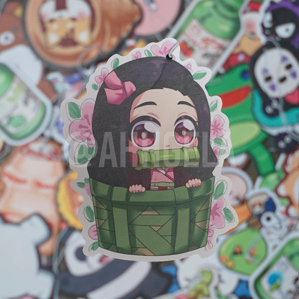 A custom air freshener designed by Ahhgela featuring an anime-style character, Nezu-chan, with a strawberry scent.